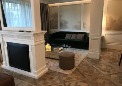 a room with a bathtub and a mirror