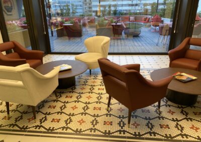 a room with chairs and tables