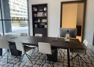 a room with a table and chairs